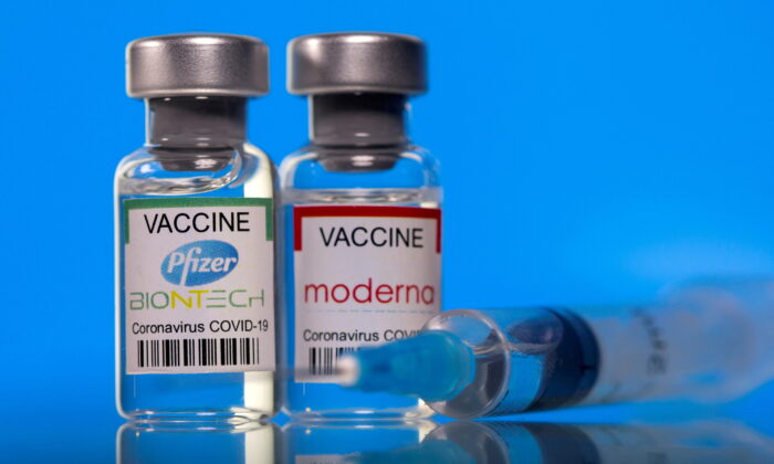Vials with Pfizer-BioNTech and Moderna coronavirus disease (COVID-19) vaccine labels on March 19, 2021. (Dado Ruvic/Illustration/Reuters)