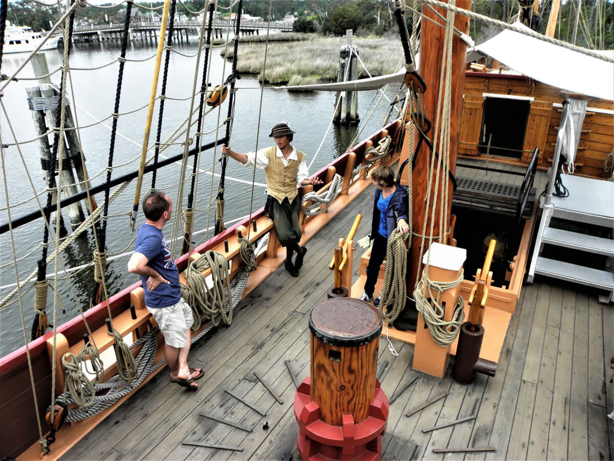 A costumed interpreter answers visitors' questions aboard the Elizabeth II in the Outer Banks of North Carolina. (Courtesy of Victor Block)
