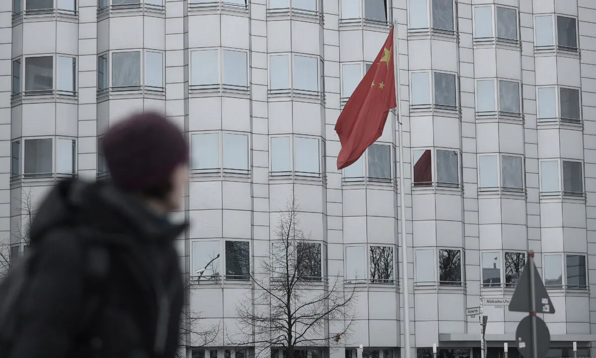 A woman walks past the Chinese Embassy in Berlin on Dec. 11, 2017. (Sean Gallup/Getty Images)