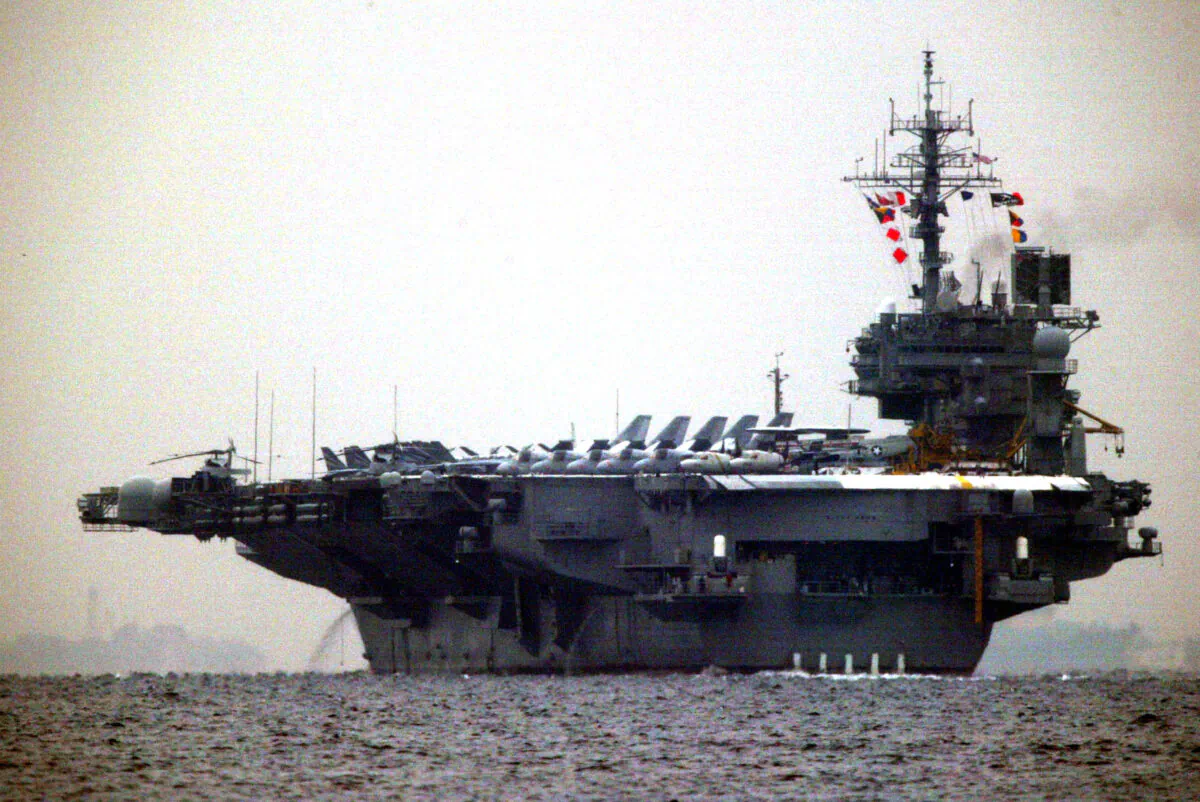 American aircraft carrier USS Kitty Hawk leaves Yokosuka naval base to monitor North Korea in Yokosuka, Japan, on Jan. 23, 2003. (Koichi Kamoshida/Getty Images)