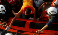 Rescuers Pull 394 Migrants From Dangerously Overcrowded Boat Off Tunisia
