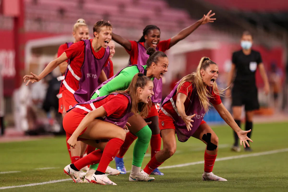 Players of Team Canada celebrate their side's first goal scored by Jessie Fleming #17 of Team Canada (not pictured) during the Women's Semi-Final match between USA and Canada on day ten of the Tokyo Olympic Games at Kashima Stadium on Aug. 2, 2021 in Kashima, Ibaraki, Japan. (Naomi Baker/Getty Images)