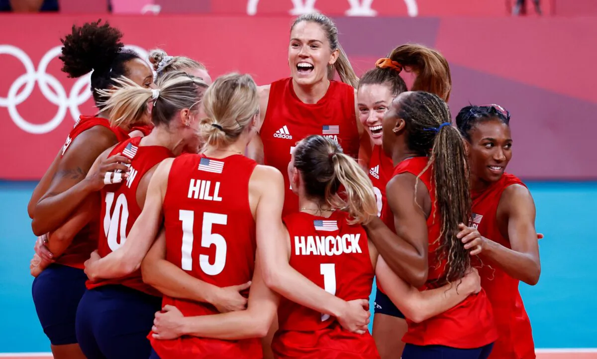 Andrea Drews of the United States celebrates with teammates, after defeating Team Italy during the Women's Preliminary—Pool B volleyball on day 10 of the Tokyo 2020 Olympic Games at Ariake Arena in Tokyo on Aug. 2, 2021. (Carlos Garcia Rawlins/Reuters)