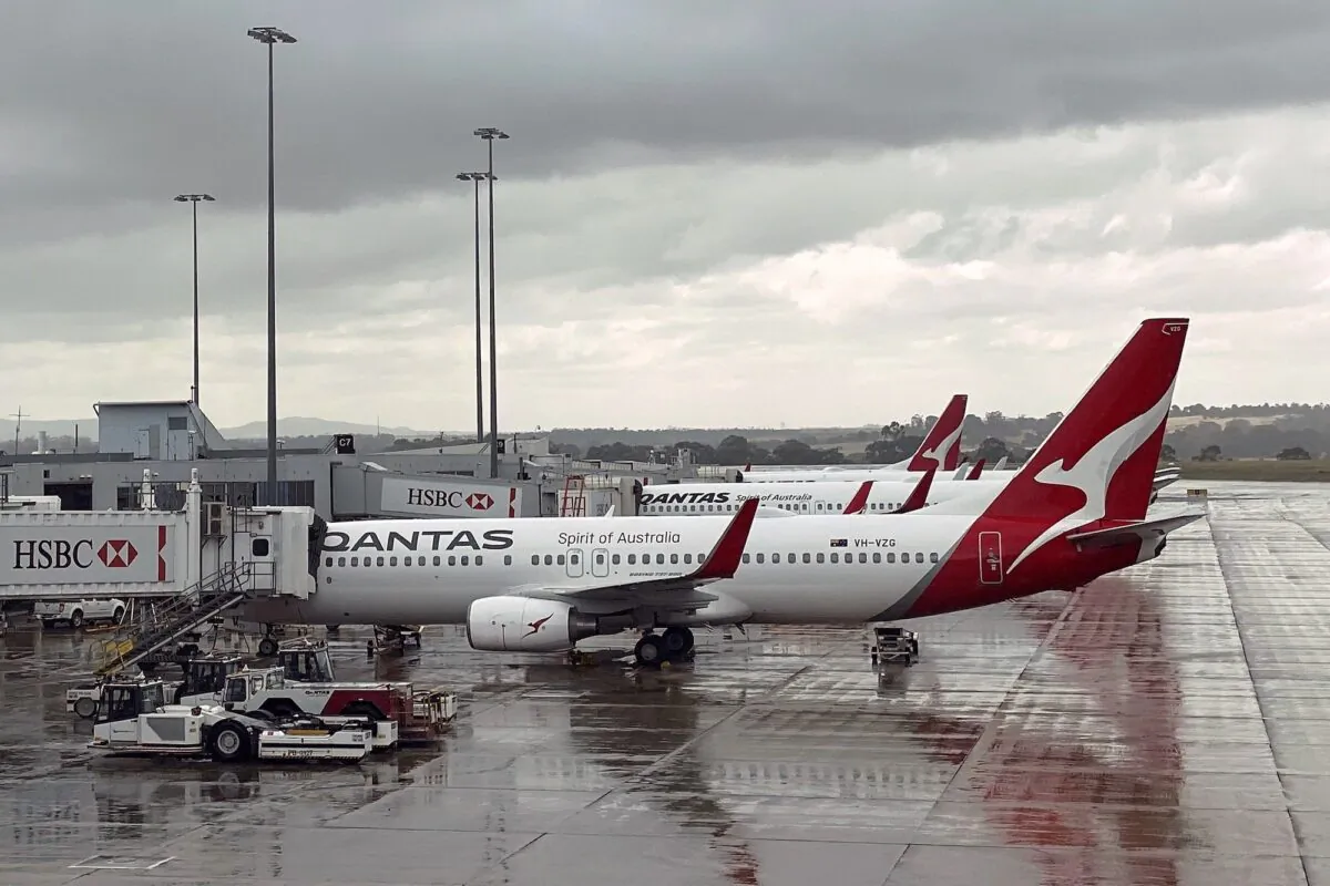 This picture taken on February 22, 2021 shows Qantas planes lined up at Melbourne's international airport. - Australian carrier Qantas on February 25, 2021 reported a 5.5 billion USD plunge in revenue during the second half of 2020 and said international passenger flights would not resume until October as the pandemic continued to devastate the industry. (Photo by Saeed KHAN / AFP) (Photo by SAEED KHAN/AFP via Getty Images)