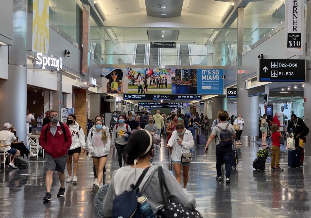 Passengers at Miami International Airport on Aug. 1, 2021, in Miami, Fla. (DANIEL SLIM/AFP via Getty Images)