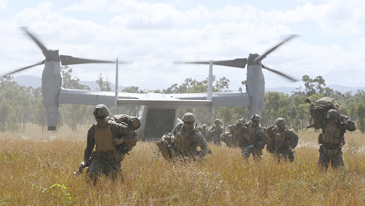 U.S. Marines disembark from a V-22 Osprey during a troop insertion as part of Exercise 'Talisman Sabre 21' in Townsville, Australia, on July 27, 2021. (Ian Hitchcock/Getty Images)