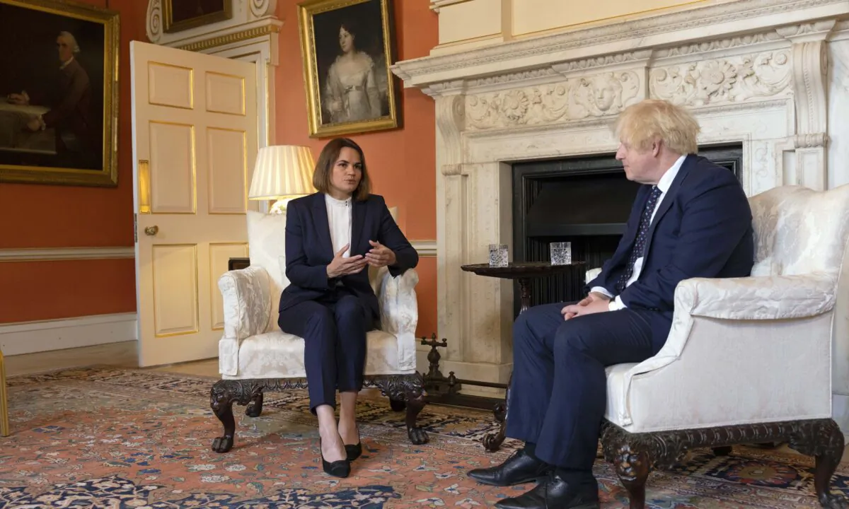 Belarusian human rights activist and politician Sviatlana Tsikhanouskaya meets Prime Minister Boris Johnson inside 10 Downing Street in London on Aug. 3, 2021. (Dan Kitwood/PA)