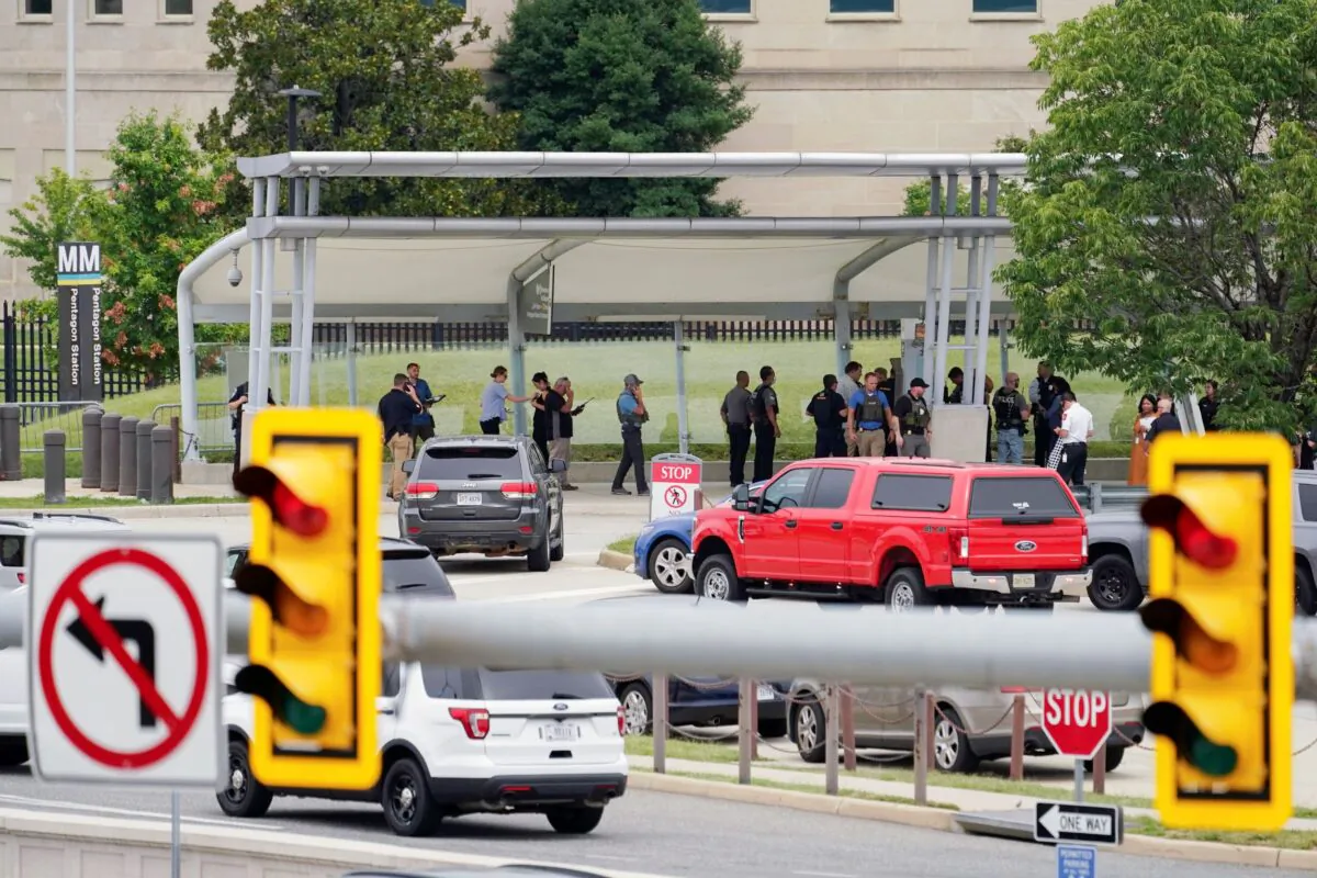 Police vehicles are seen outside the Pentagon Metro area, at the Pentagon in Washington, on Aug. 3, 2021. (Andrew Harnik/AP Photo)