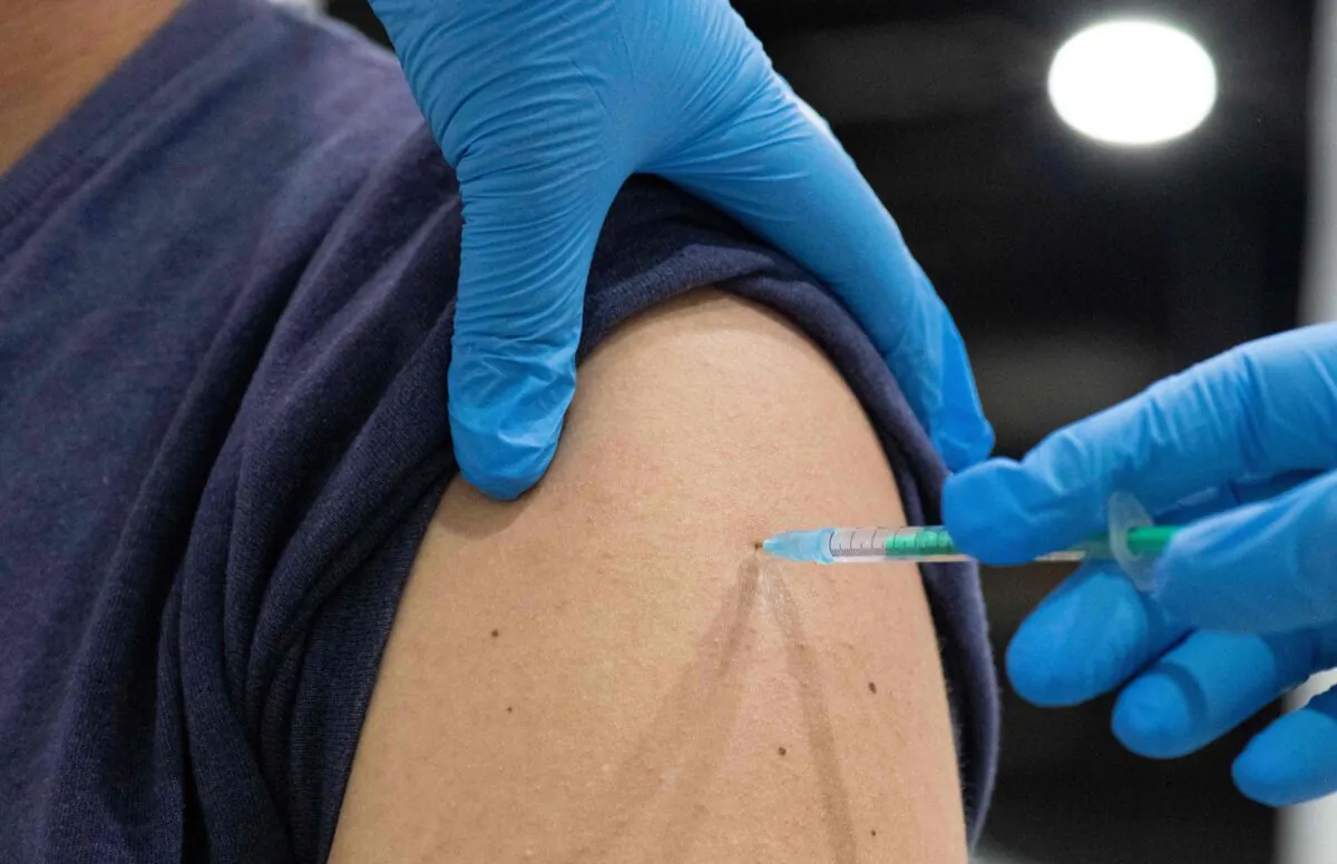 A man gets his vaccination with the Johnson & Johnson vaccine at the district vaccination center in Ludwigsburg, southern Germany, on Aug. 3, 2021. (Thomas Kienzle/AFP via Getty Images)