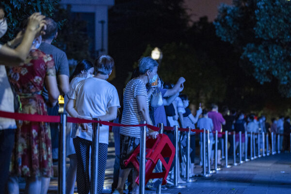 Residents line up to test for the CCP virus in Wuhan in China’s central Hubei Province on Aug. 3, 2021. (STR/AFP via Getty Images)