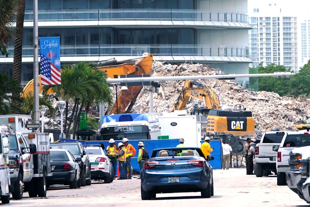Crews work in the rubble of the Champlain Towers South building, as removal and recovery work continues at the site of the partially collapsed condo building in Surfside, Fla., on July 13, 2021. (Lynne Sladky/File/AP Photo)
