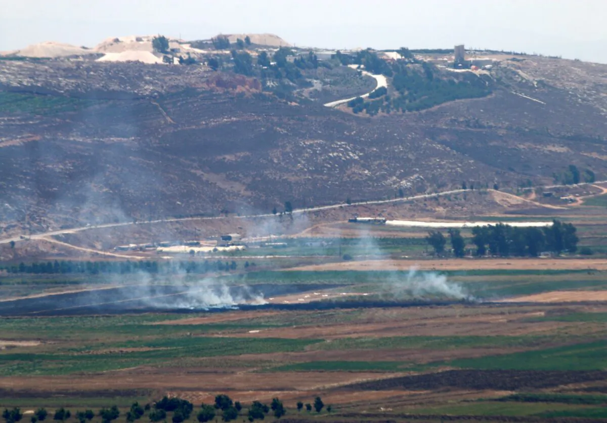 Smoke rises, seen from Marjayoun, near the border with Israel, Lebanon, on Aug. 4, 2021. (Karamallah Daher/Reuters)