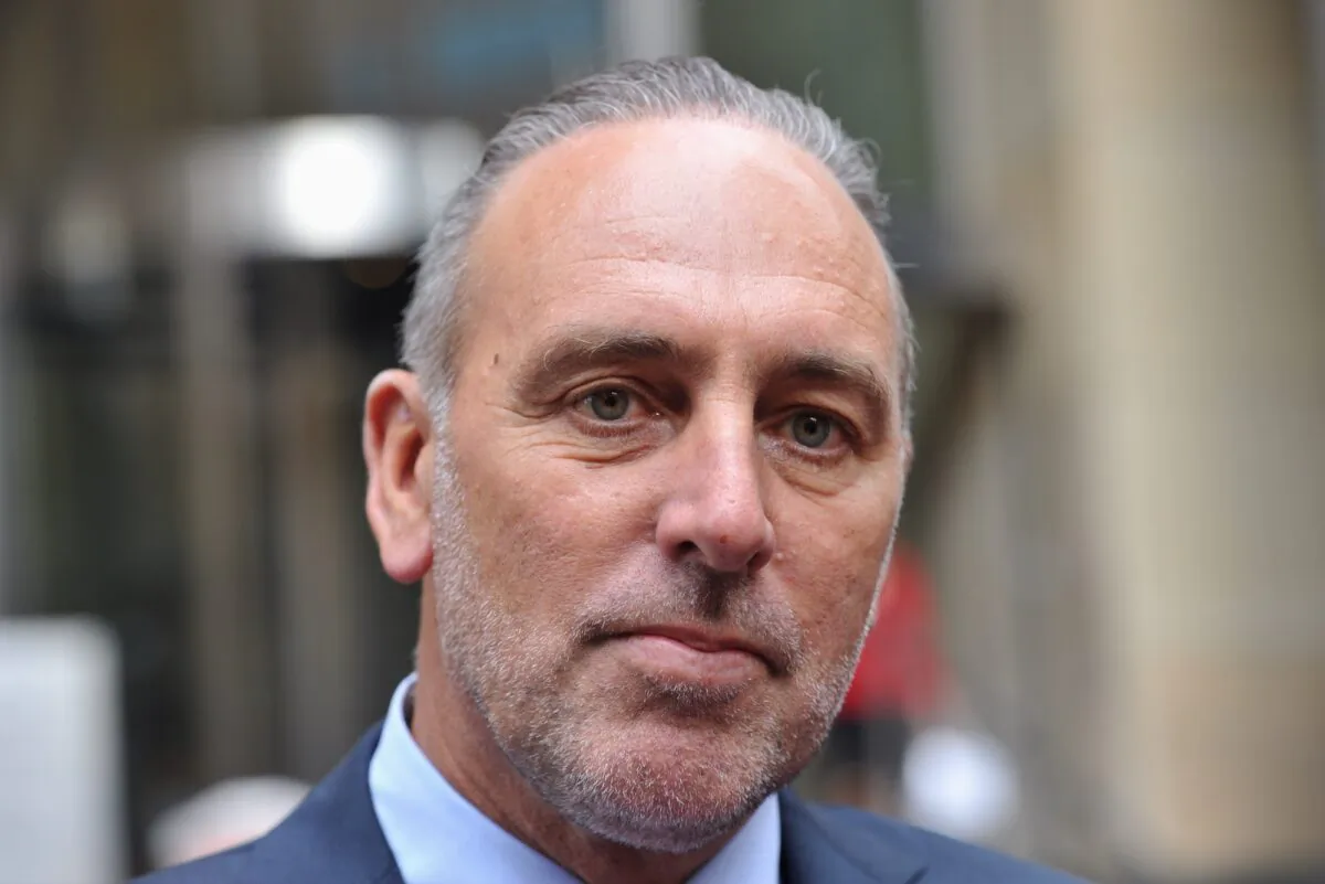 Founder of the Hillsong Church, Pastor Brian Houston leaves the Royal Commission into Institutional Responses to Child Sexual Abuse hearings in Sydney, Australia on Oct. 8, 2014. (AAP Image/Paul Miller)