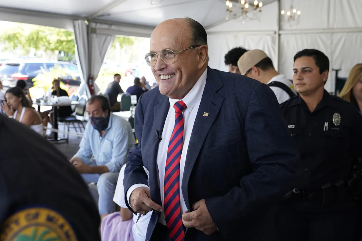 Former NYC Mayor, Rudy Giuliani arrives at a news conference in the Little Havana neighborhood of Miami, on July 26, 2021. (AP Photo/Wilfredo Lee)