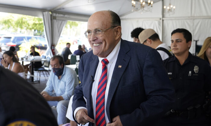 Former NYC Mayor, Rudy Giuliani arrives at a news conference in the Little Havana neighborhood of Miami, on July 26, 2021. (AP Photo/Wilfredo Lee)