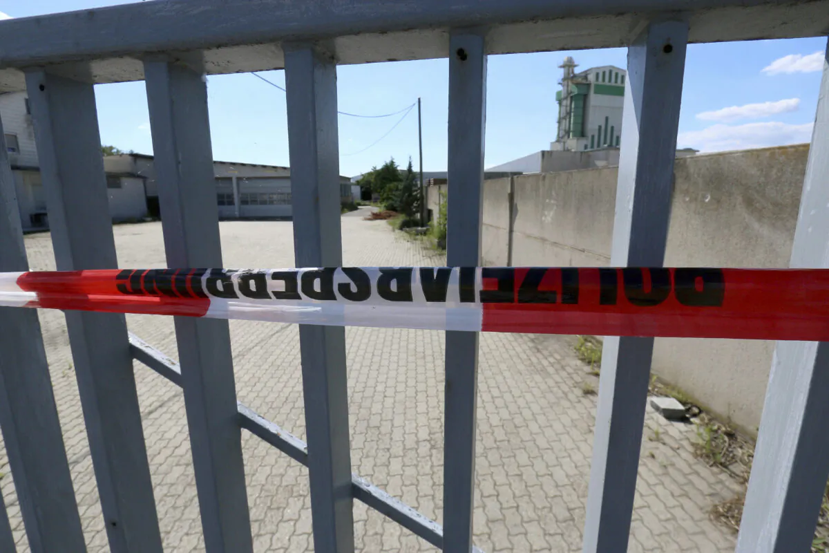 The property where a man was shot dead, is sealed off with police tape in Gerasdorf, Austria, on July 5, 2020. (Ronald Zak/AP Photo)