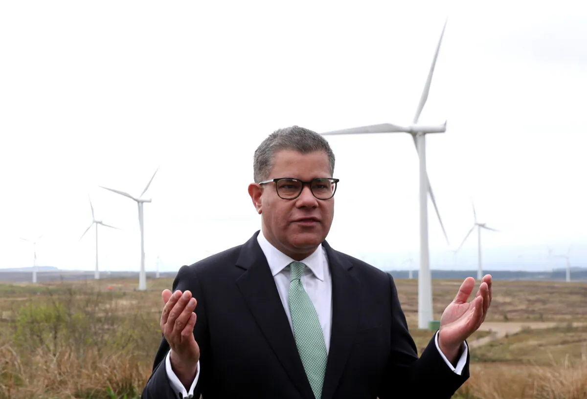 COP26 President Alok Sharma rehearses a speech at Whitelee Windfarm, near Glasgow, Scotland, on May 14, 2021. (Russell Cheyne - WPA Pool/Getty Images)