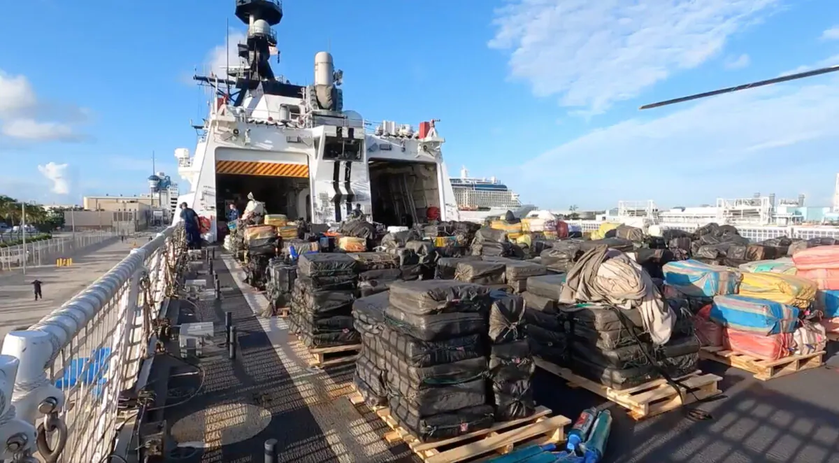Bales of illicit cocaine and marijuana aboard U.S. Coast Guard Cutter James. (Screenshot/U.S. Coast Guard)