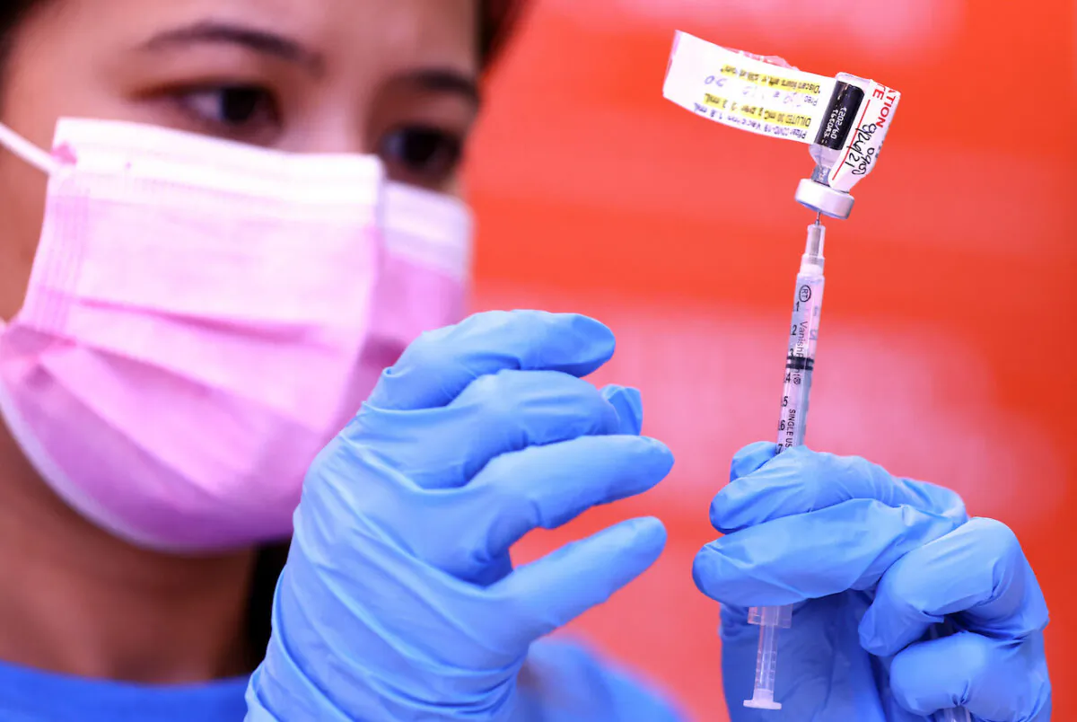 A registered nurse prepares a dose of the Pfizer COVID-19 vaccine in Wilmington, Calif., on July 29, 2021. (Mario Tama/Getty Images)