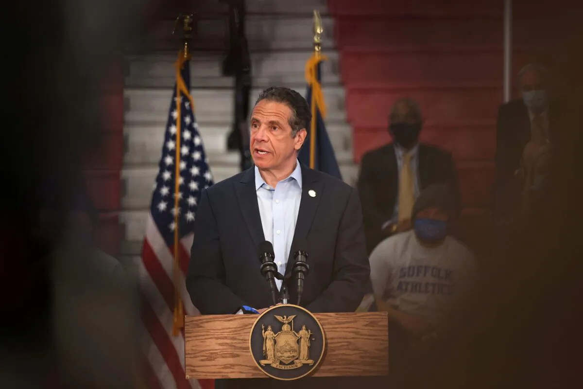 New York Governor Andrew Cuomo speaks during a news conference in Brentwood, N.Y., on April 12, 2021. (Michael M. Santiago/Pool via Reuters)