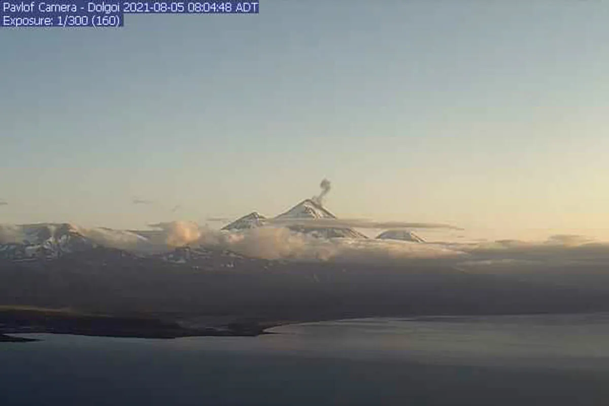 In this webcam image, is the Pavlof Volcano in a state of eruption with episodic low-level ash emissions, on Aug. 5, 2021. (Alaska Volcano Observatory via AP)