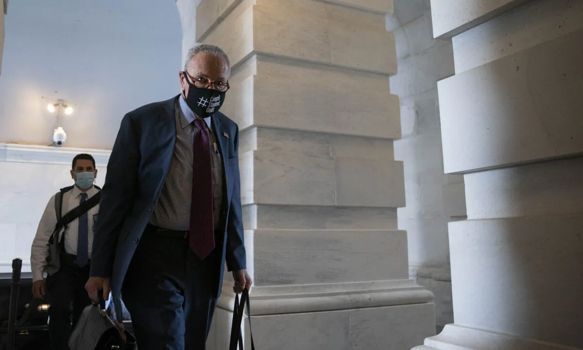 Senate Majority Leader Chuck Schumer (D-N.Y.) arrives to the U.S. Capitol in the District of Columbia on Aug. 7, 2021. (Sarah Silbiger/Getty Images)