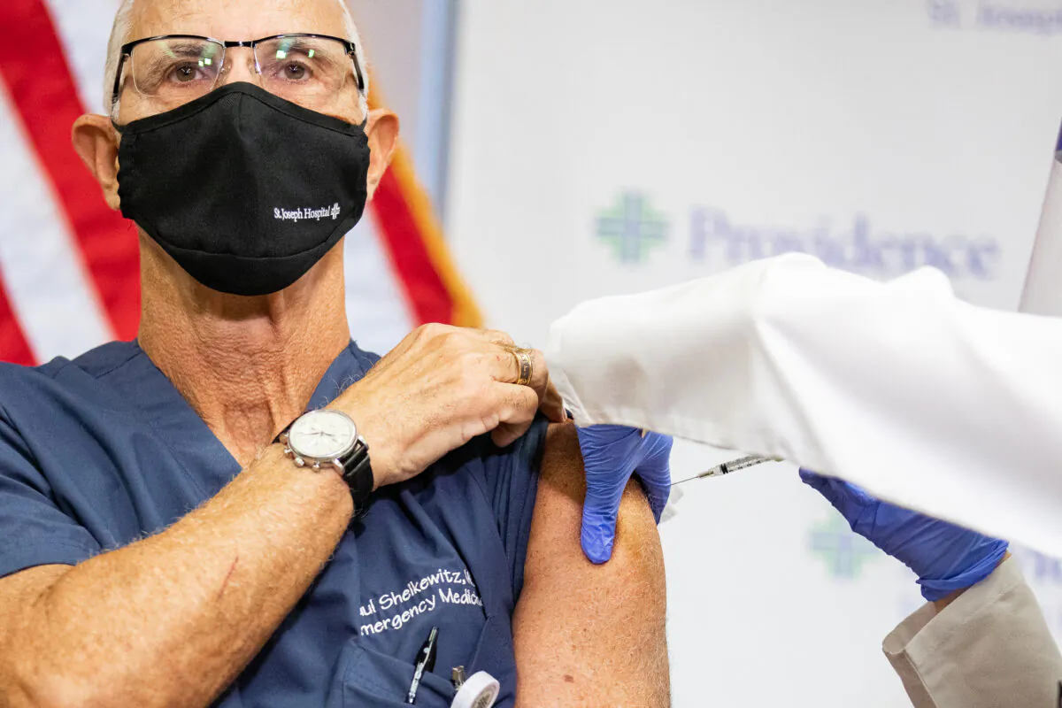The first doctor to receive the Coronavirus vaccination was Paul Sheikewitz MD at St. Joseph Hospital on Dec. 16, 2020. (John Fredricks/The Epoch Times)