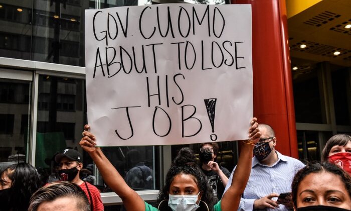 People participate in a protest against N.Y. Gov. Andrew Cuomo in New York City on Aug. 4, 2021. (Stephanie Keith/Getty Images)