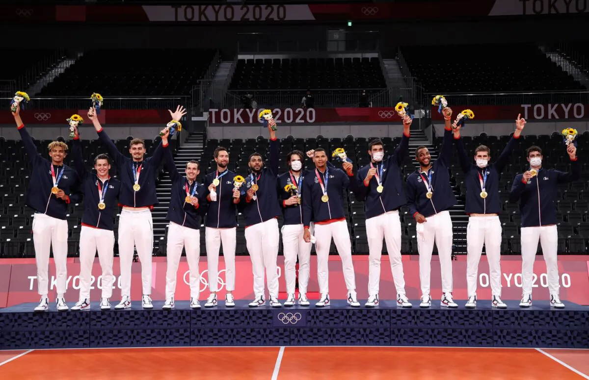 Players of Team France pose with their Gold Medals during the Victory Ceremony following the Men's Gold Medal Volleyball match between France and ROC on day fifteen of the Tokyo 2020 Olympic Games at Ariake Arena in Tokyo, Japan, on Aug. 7, 2021. (Toru Hanai/Getty Images)