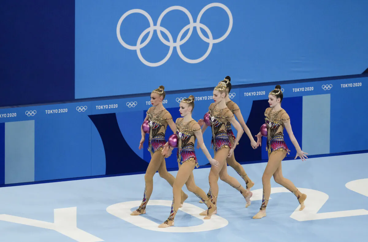 Russian Olympic Committee's rhythmic gymnastics' team performs during the group all-around final at the 2020 Summer Olympics, in Tokyo, Japan, on Aug. 8, 2021, . (Ashley Landis/AP Photo)