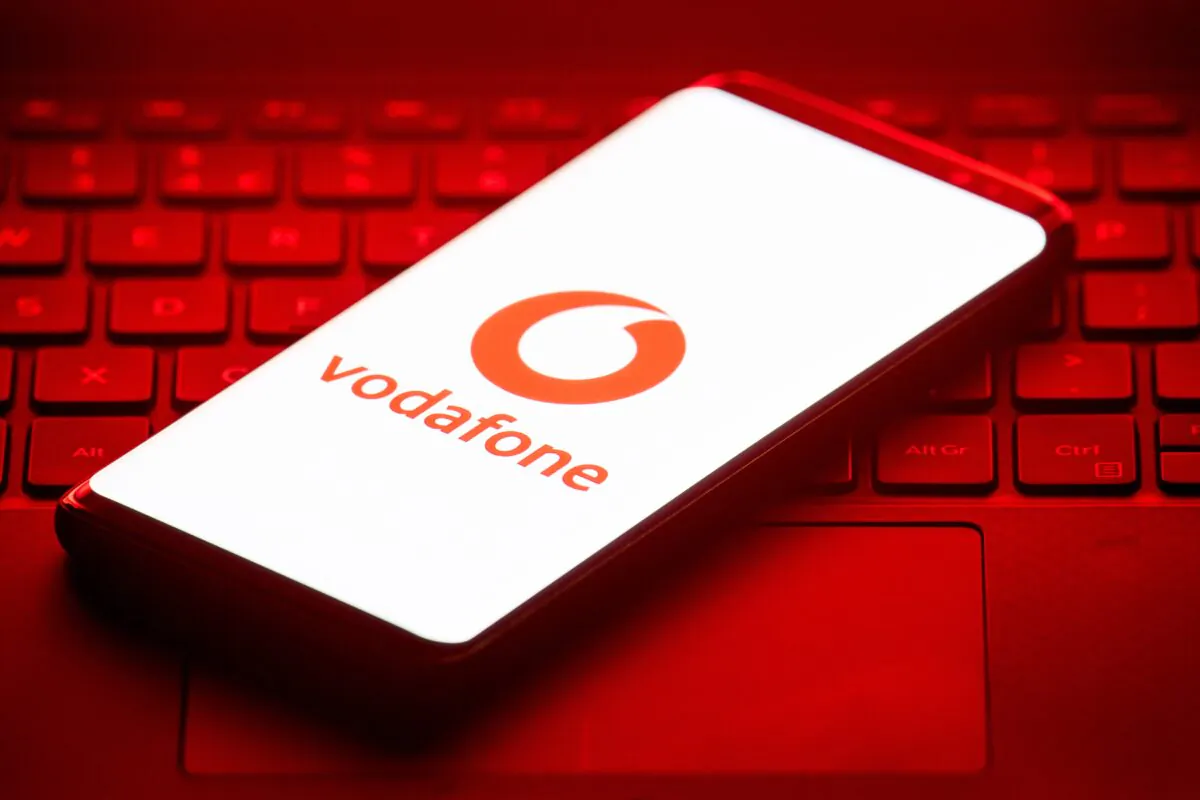 A Vodafone logo displayed on a mobile phone in a file photo. (Dominic Lipinski/PA)