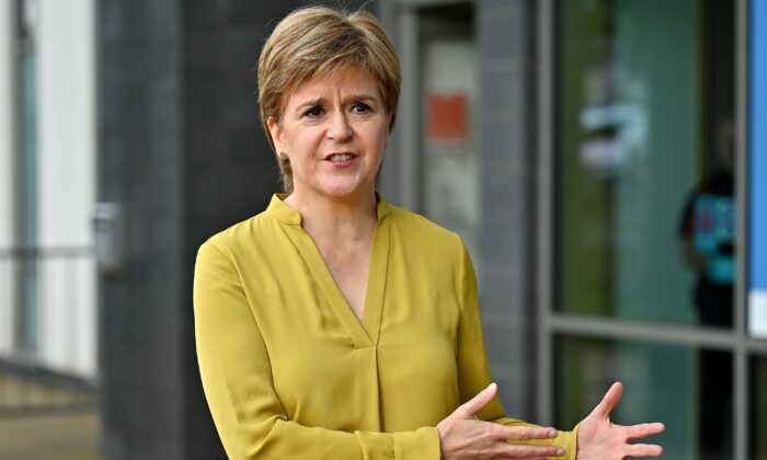 First Minister Nicola Sturgeon visiting Barrhead Foundry vaccination centre near Glasgow in Scotland on Aug. 9, 2021. (Jeff J Mitchell/PA)