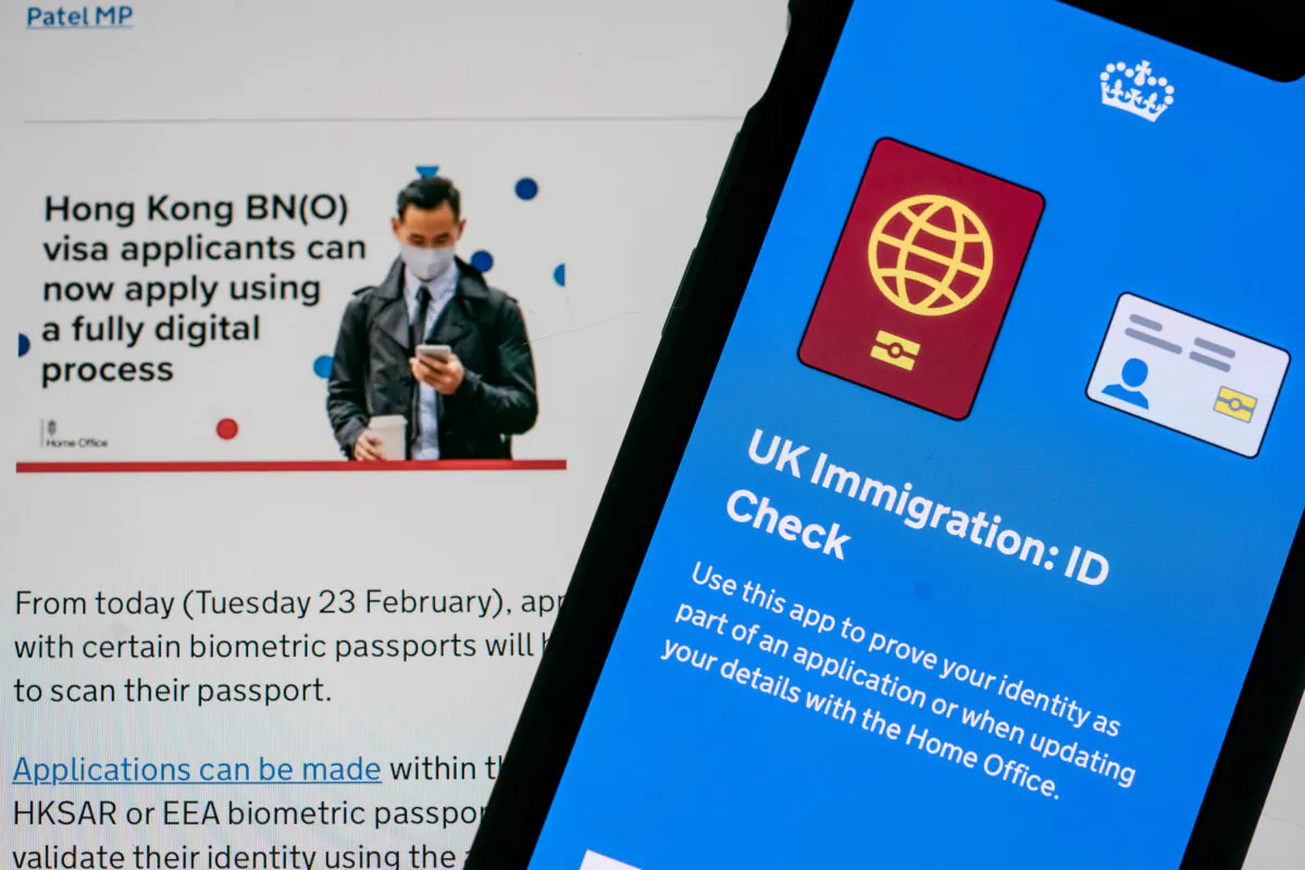 The UK government launched a fully digital process for Hong Kong BN(O) visa applicants with certain biometric passports to apply from a smartphone app, on Feb. 23, 2021. (Anthony Kwan/Getty Images)