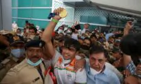 Olympic Gold Medalist Chopra Returns to India as Superstar