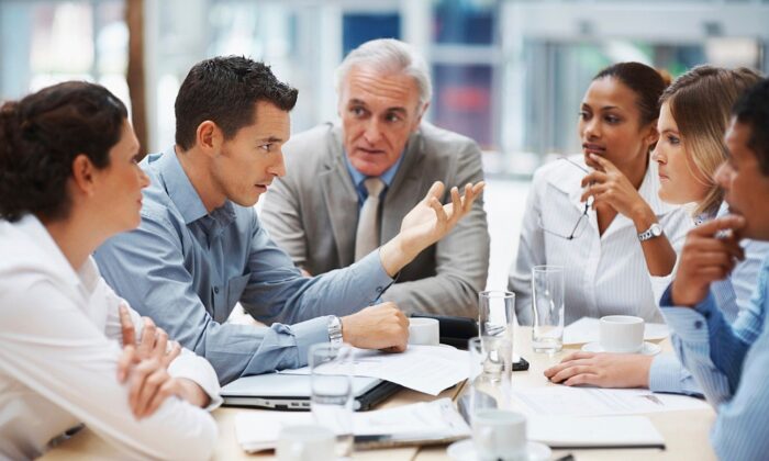 A stock photo of a corporate business meeting. (Pixabay)