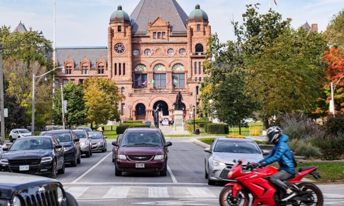 Traffic passes in front of the Legislative Assembly of Ontario building on Oct. 20, 2018. (Vadim Rodnev/Shutterstock)