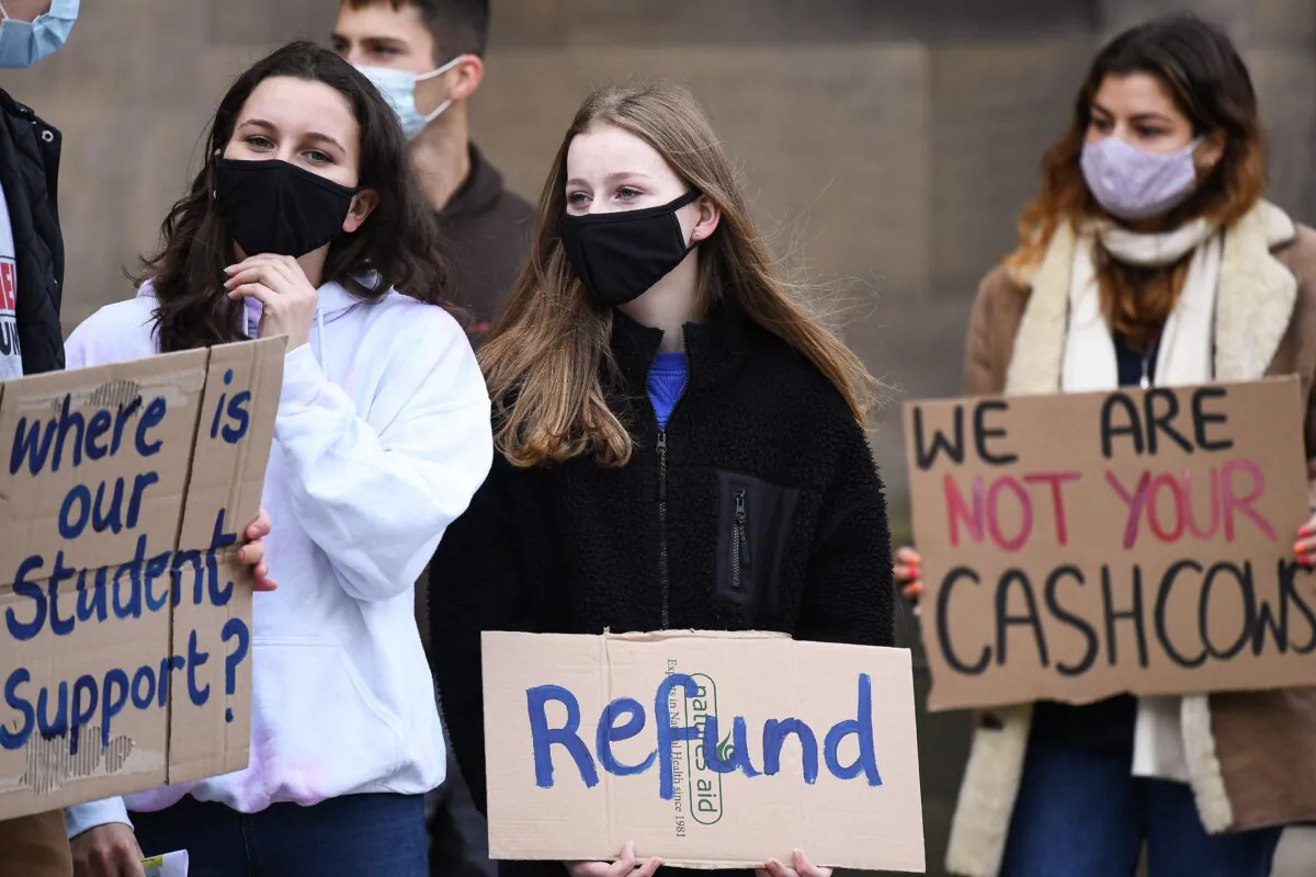 Edinburgh University students protest against the false promise of ‘hybrid learning’ to new and returning students in Edinburgh, Scotland, on Oct. 24, 2020. (Jeff J Mitchell/Getty Images)