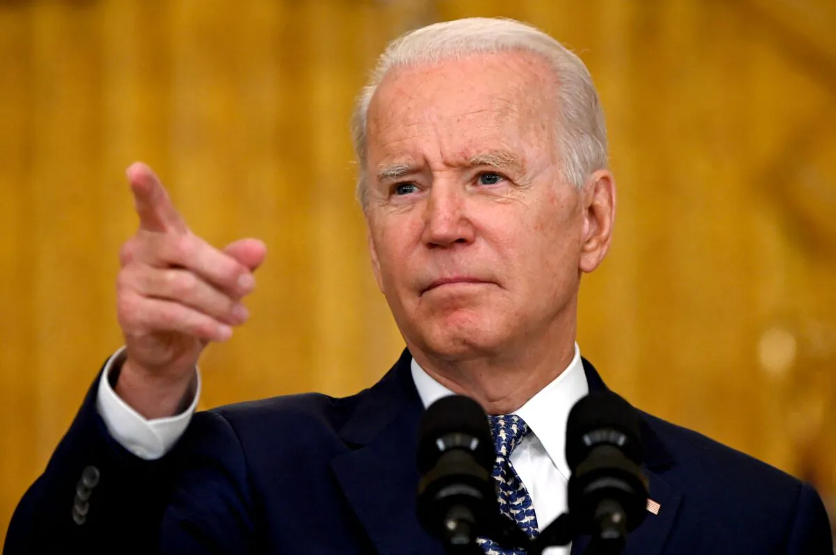 President Joe Biden takes a question during a press conference in Washington on Aug. 10, 2021. (Jim Watson/AFP via Getty Images)