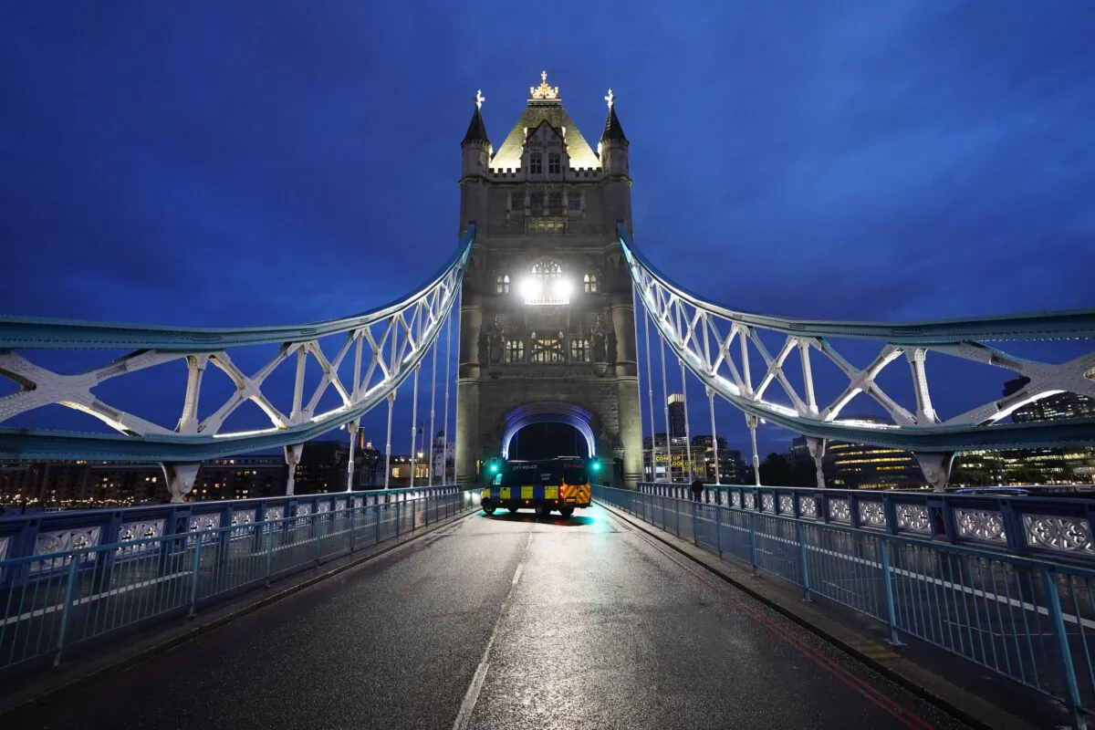 Tower Bridge in central London, which has been left open due to a technical fault, causing traffic problems, in London, on Aug. 9, 2021. (Ian West/PA)