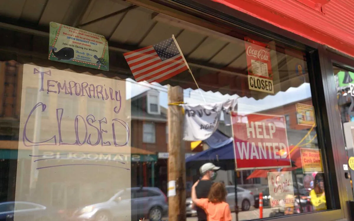 Signs blaring “Help Wanted” and “Temporarily Closed” have appeared all over the Strip District. (Justin Merriman)