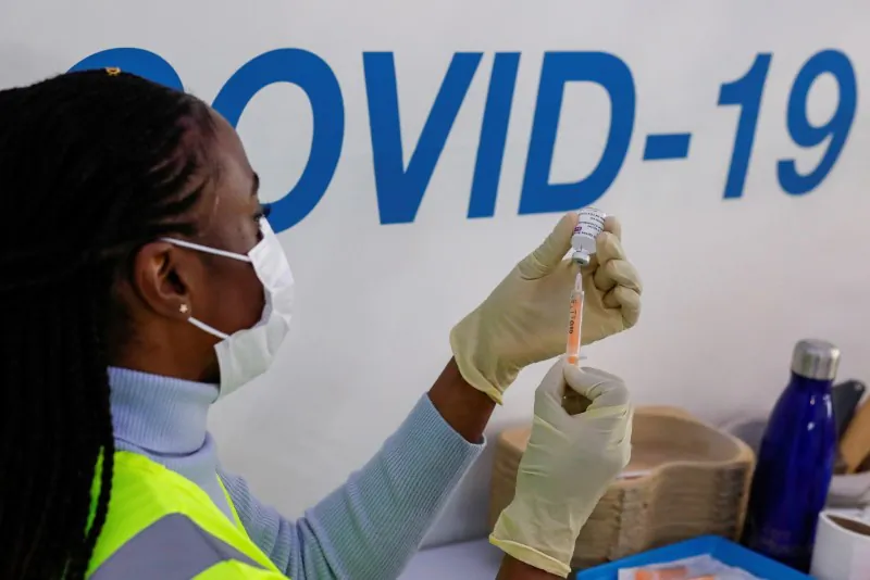A dose of AstraZeneca vaccine is prepared at a COVID-19 vaccination centre in the Odeon Luxe Cinema in Maidstone, UK, on Feb. 10, 2021. (Andrew Couldridge/Reuters)