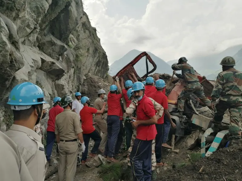 Indo–Tibetan Border Police personnel remove a damaged truck during a rescue operation at the site of a landslide in Kinnaur district in the northern state of Himachal Pradesh, India, on Aug. 11, 2021. (Indo-Tibetan Border Police/Handout via Reuters)