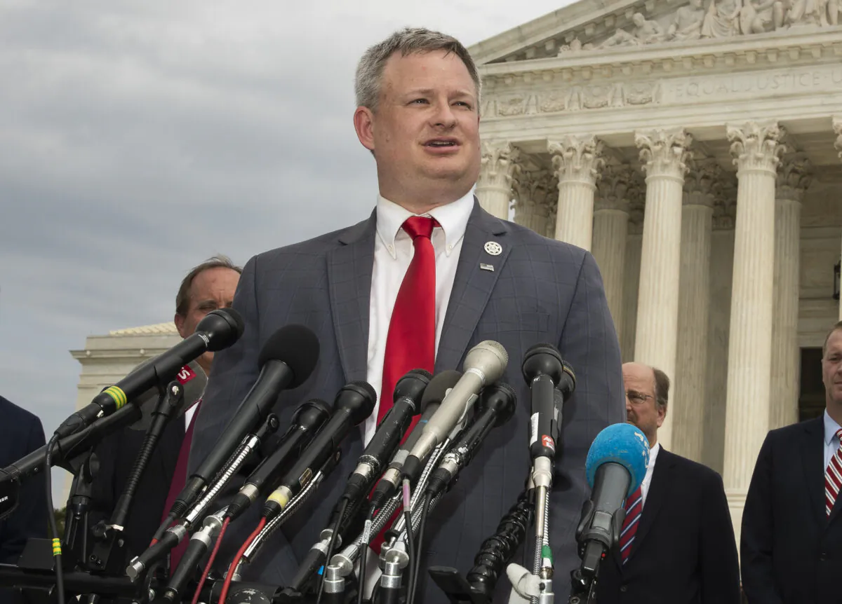 South Dakota Attorney General Jason Ravnsborg speaks to reporters in front of the U.S. Supreme Court in Washington, on Sept. 9, 2019. (Manuel Balce Ceneta/AP Photo)