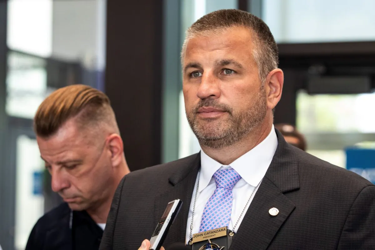 Fraternal Order of Police Lodge 7 President John Catanzara speaks to reporters at the Leighton Criminal Courthouse in Chicago on Aug. 10, 2021. (Ashlee Rezin/Chicago Sun-Times via AP)