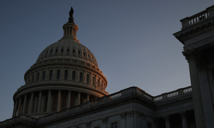 The U.S. Capitol Dome is illuminated by the sunset in Washington on Aug. 2, 2021. (Anna Moneymaker/Getty Images)