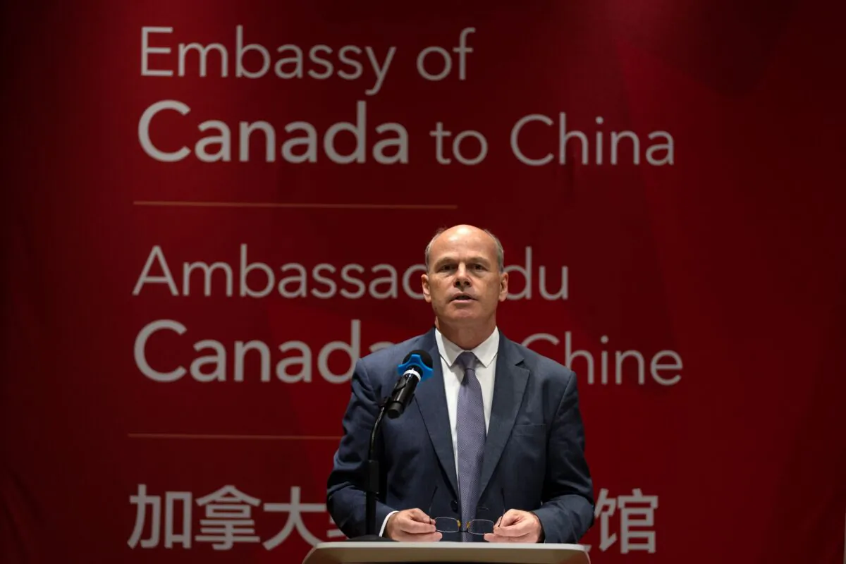 Jim Nickel, the deputy chief of mission for the Canadian Embassy in China, speaks at an event held in connection with the announcement of the sentence for Canadian citizen Michael Spavor at the Canadian Embassy in Beijing on Aug. 11, 2021. (AP Photo/Mark Schiefelbein)