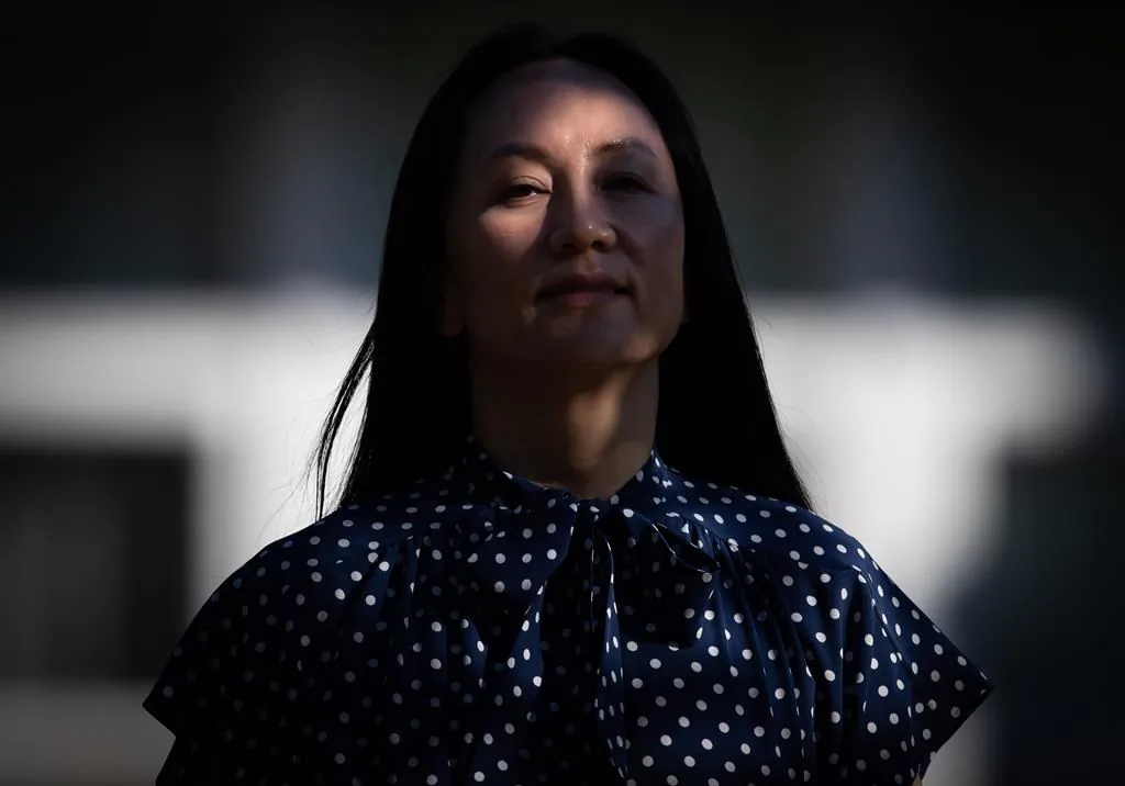 Meng Wanzhou, chief financial officer of Huawei, leaves home to attend her extradition hearing at B.C. Supreme Court, in Vancouver, B.C., on Aug. 11, 2021. (The Canadian Press/Darryl Dyck)