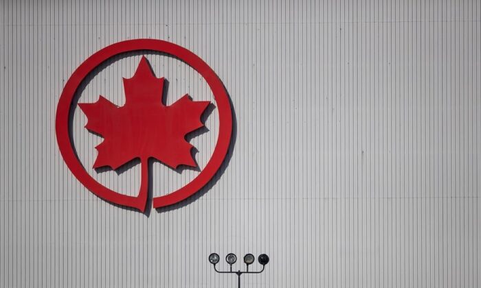 The Air Canada logo will appear in the hangar at Vancouver International Airport in Richmond, British Columbia, March 20, 2020.  (The Canadian Press / Darryl Dyck)