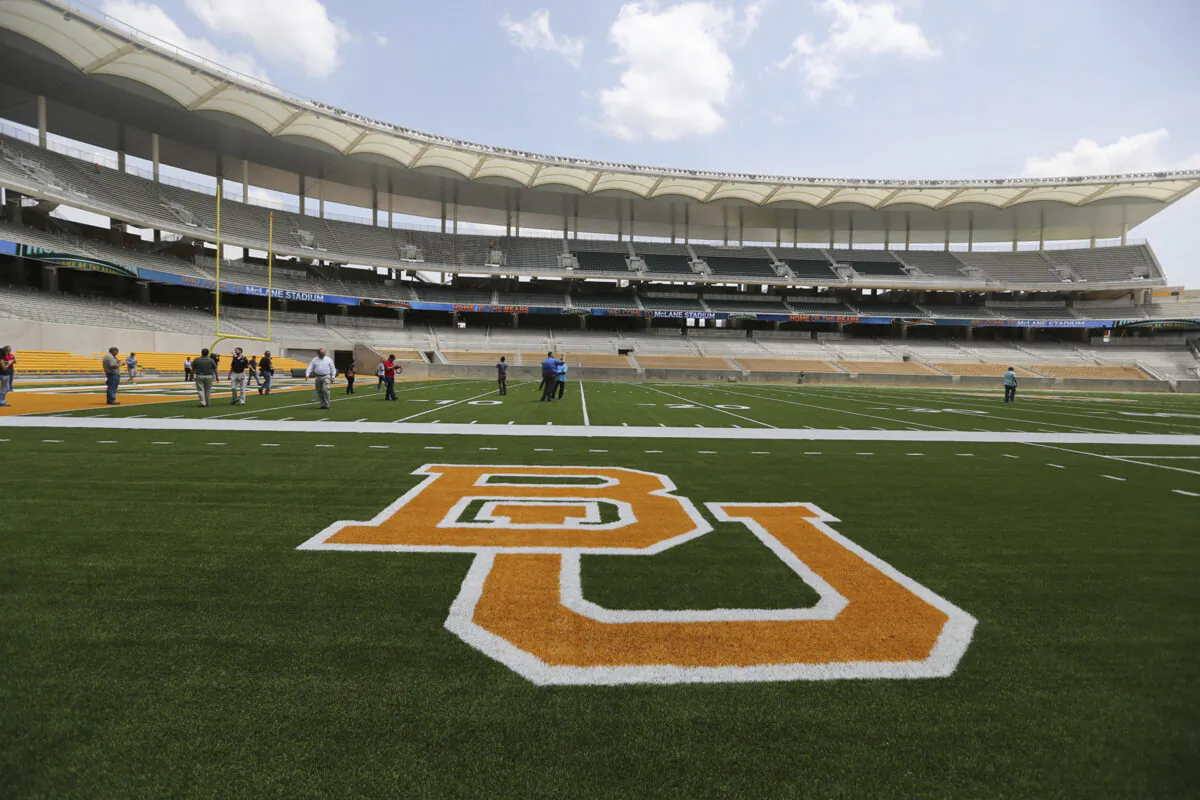 The Baylor University logo is displayed on the football field at McLane Stadium in Waco, Texas, on Aug. 18, 2014. (Waco Tribune-Herald via AP/AP Photo)