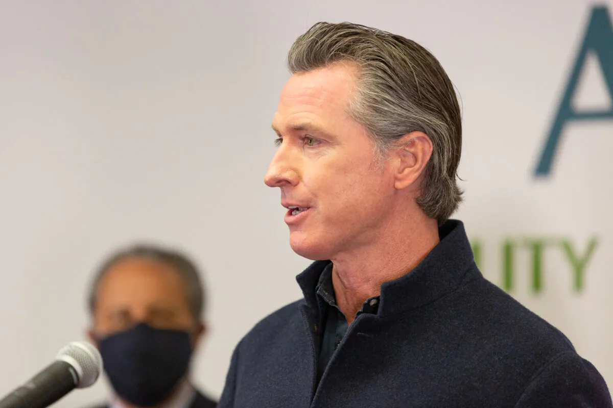 Governor Gavin Newsom speaks to reporters at AltaMed Urgent Care in Santa Ana, Calif., on March 25, 2021. (John Fredricks/The Epoch Times)